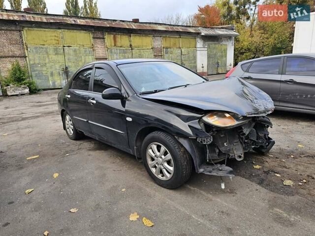Чорний Кіа Черато, об'ємом двигуна 1.59 л та пробігом 200 тис. км за 1350 $, фото 1 на Automoto.ua