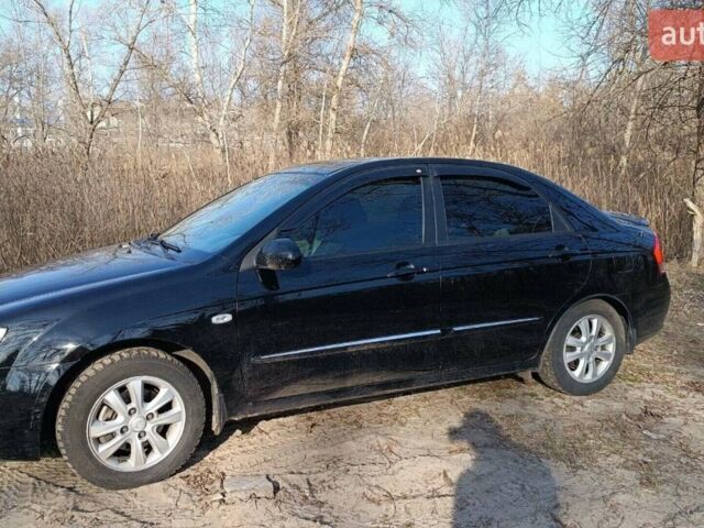 Черный Киа Черато, объемом двигателя 1.98 л и пробегом 174 тыс. км за 5900 $, фото 1 на Automoto.ua