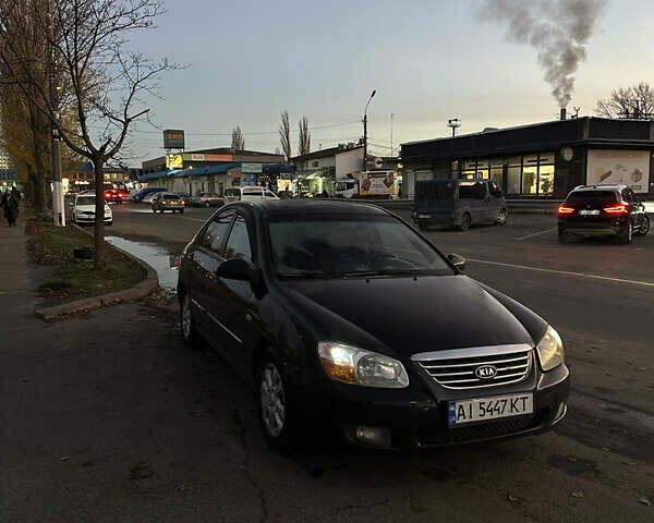 Черный Киа Черато, объемом двигателя 1.6 л и пробегом 294 тыс. км за 3500 $, фото 1 на Automoto.ua