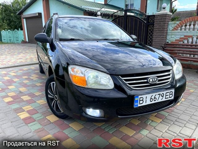 Черный Киа Черато, объемом двигателя 1.6 л и пробегом 190 тыс. км за 4350 $, фото 1 на Automoto.ua