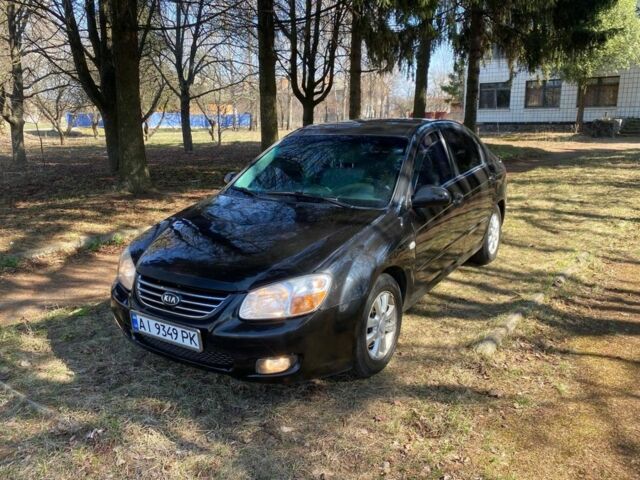 Черный Киа Черато, объемом двигателя 2 л и пробегом 217 тыс. км за 3300 $, фото 1 на Automoto.ua