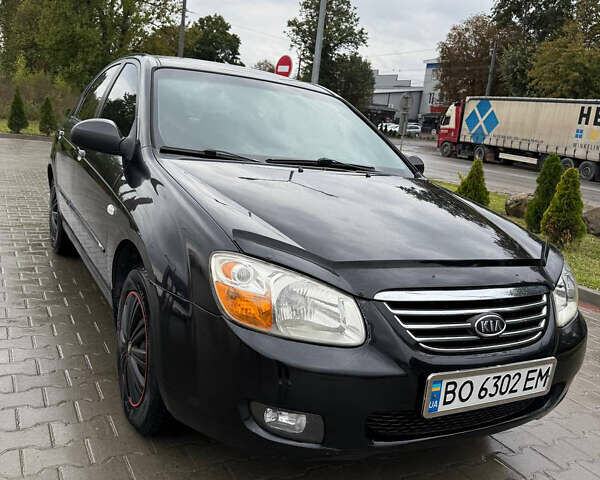 Чорний Кіа Черато, об'ємом двигуна 1.59 л та пробігом 206 тис. км за 3999 $, фото 1 на Automoto.ua
