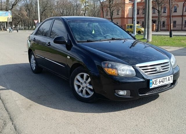 Черный Киа Черато, объемом двигателя 1.6 л и пробегом 184 тыс. км за 5300 $, фото 1 на Automoto.ua