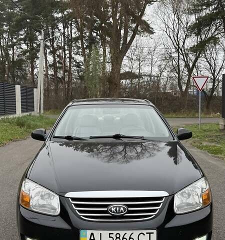 Черный Киа Черато, объемом двигателя 2 л и пробегом 186 тыс. км за 4999 $, фото 1 на Automoto.ua