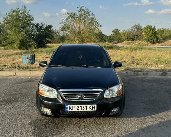 Чорний Кіа Черато, об'ємом двигуна 1.6 л та пробігом 156 тис. км за 4900 $, фото 1 на Automoto.ua