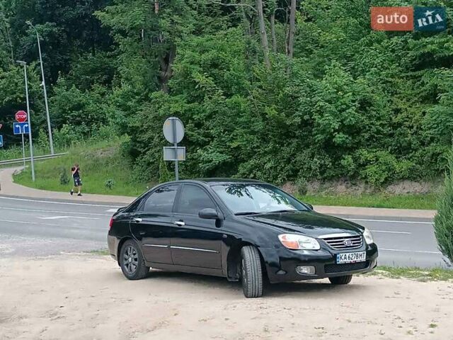 Черный Киа Черато, объемом двигателя 2 л и пробегом 298 тыс. км за 4250 $, фото 1 на Automoto.ua