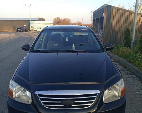 Чорний Кіа Черато, об'ємом двигуна 1.6 л та пробігом 232 тис. км за 4250 $, фото 1 на Automoto.ua