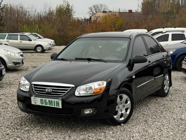 Черный Киа Черато, объемом двигателя 1.6 л и пробегом 258 тыс. км за 5200 $, фото 1 на Automoto.ua