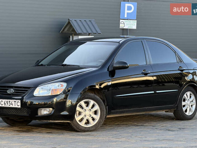 Черный Киа Черато, объемом двигателя 1.98 л и пробегом 180 тыс. км за 5750 $, фото 1 на Automoto.ua