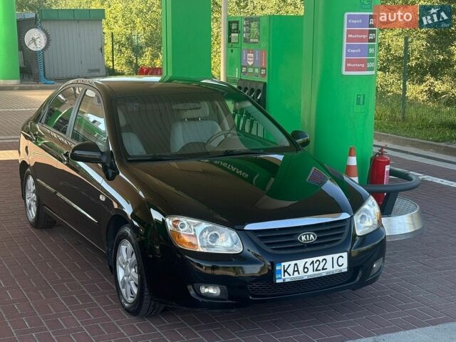 Чорний Кіа Черато, об'ємом двигуна 2 л та пробігом 310 тис. км за 4500 $, фото 1 на Automoto.ua