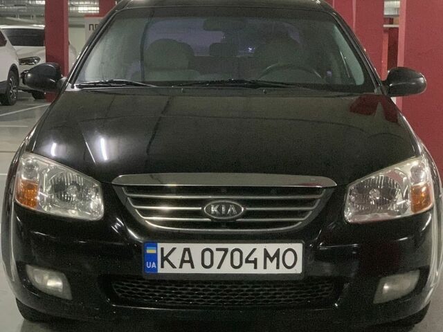 Черный Киа Черато, объемом двигателя 1.98 л и пробегом 223 тыс. км за 3950 $, фото 1 на Automoto.ua