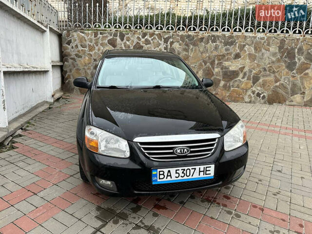 Чорний Кіа Черато, об'ємом двигуна 1.59 л та пробігом 192 тис. км за 4500 $, фото 1 на Automoto.ua