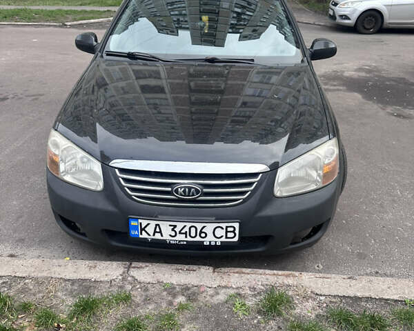 Черный Киа Черато, объемом двигателя 2 л и пробегом 220 тыс. км за 3400 $, фото 1 на Automoto.ua