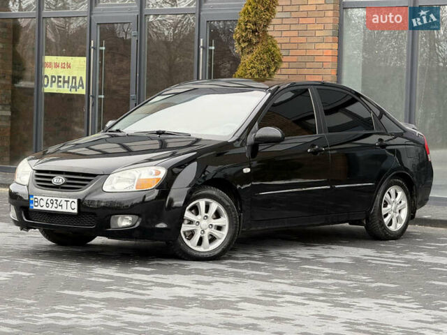 Черный Киа Черато, объемом двигателя 1.98 л и пробегом 180 тыс. км за 5500 $, фото 1 на Automoto.ua