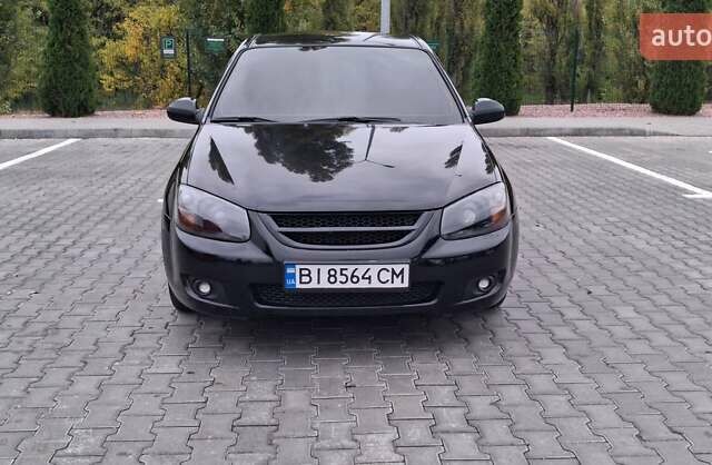 Кіа Черато 2008 у Кременчуге на Automoto.ua Чорний Кіа Черато, об'ємом двигуна 2 л та пробігом 193 тис. км за 5300 $, фото 1 на Automoto.ua
