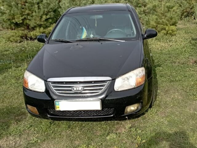 Черный Киа Черато, объемом двигателя 1.6 л и пробегом 380 тыс. км за 3700 $, фото 1 на Automoto.ua