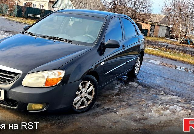 Чорний Кіа Черато, об'ємом двигуна 2 л та пробігом 25600 тис. км за 3600 $, фото 1 на Automoto.ua