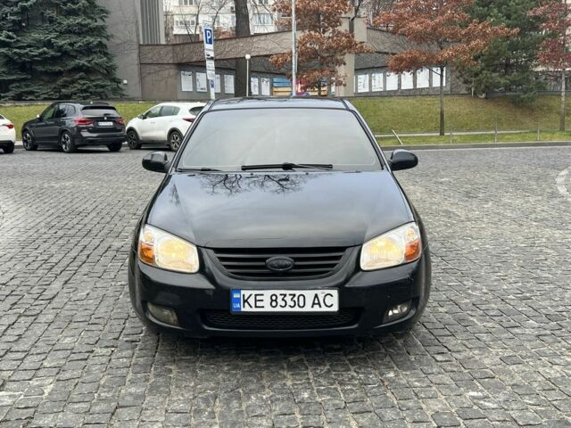Чорний Кіа Черато, об'ємом двигуна 1.6 л та пробігом 300 тис. км за 4700 $, фото 1 на Automoto.ua