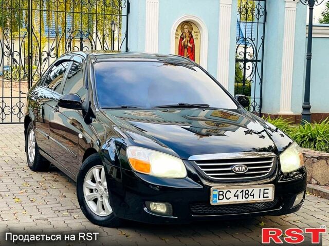 Черный Киа Черато, объемом двигателя 1.6 л и пробегом 167 тыс. км за 3950 $, фото 1 на Automoto.ua