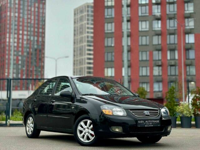 Чорний Кіа Черато, об'ємом двигуна 2 л та пробігом 270 тис. км за 4000 $, фото 1 на Automoto.ua
