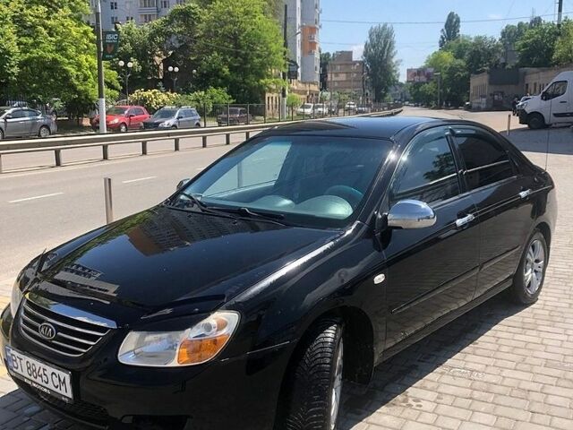 Черный Киа Черато, объемом двигателя 1.6 л и пробегом 180 тыс. км за 3850 $, фото 1 на Automoto.ua