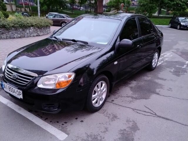 Чорний Кіа Черато, об'ємом двигуна 1.6 л та пробігом 180 тис. км за 4500 $, фото 1 на Automoto.ua