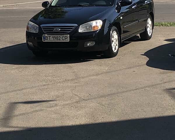 Чорний Кіа Черато, об'ємом двигуна 1.6 л та пробігом 260 тис. км за 4700 $, фото 1 на Automoto.ua