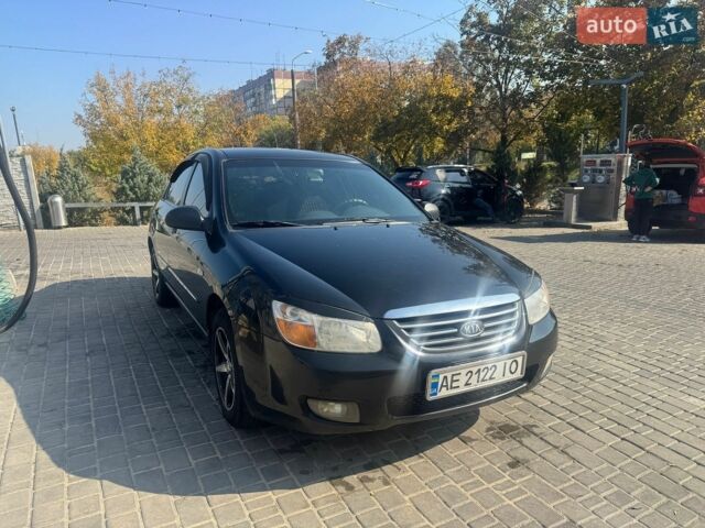 Черный Киа Черато, объемом двигателя 1.6 л и пробегом 435 тыс. км за 3800 $, фото 1 на Automoto.ua