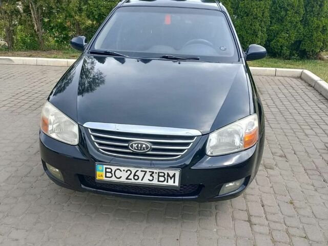 Чорний Кіа Черато, об'ємом двигуна 2 л та пробігом 382 тис. км за 3500 $, фото 1 на Automoto.ua