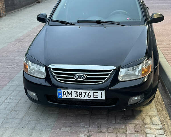 Черный Киа Черато, объемом двигателя 1.6 л и пробегом 244 тыс. км за 4450 $, фото 1 на Automoto.ua