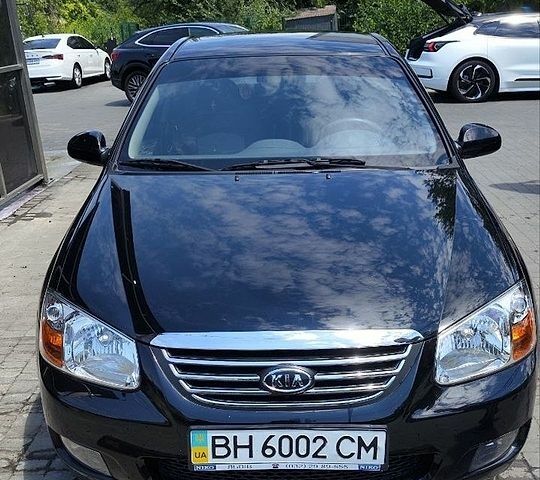 Чорний Кіа Черато, об'ємом двигуна 1.59 л та пробігом 70 тис. км за 5500 $, фото 1 на Automoto.ua