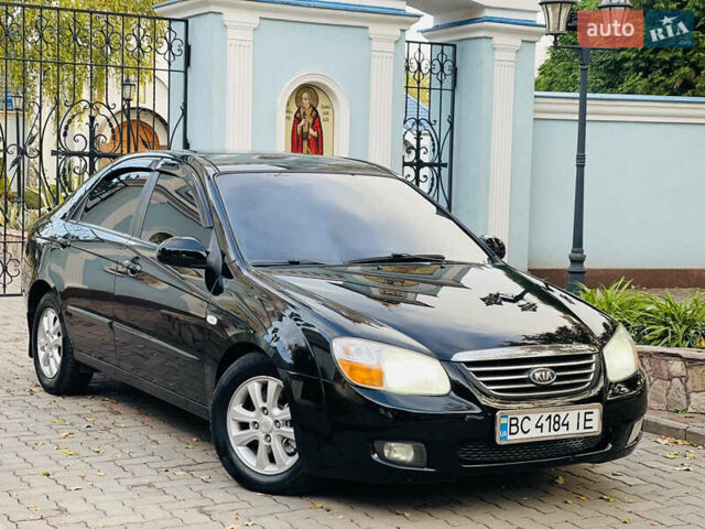 Черный Киа Черато, объемом двигателя 1.6 л и пробегом 167 тыс. км за 4950 $, фото 1 на Automoto.ua