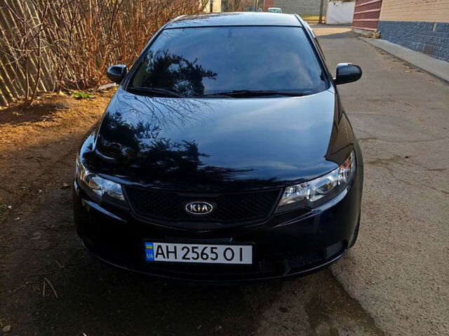 Чорний Кіа Черато, об'ємом двигуна 1.6 л та пробігом 161 тис. км за 7300 $, фото 1 на Automoto.ua