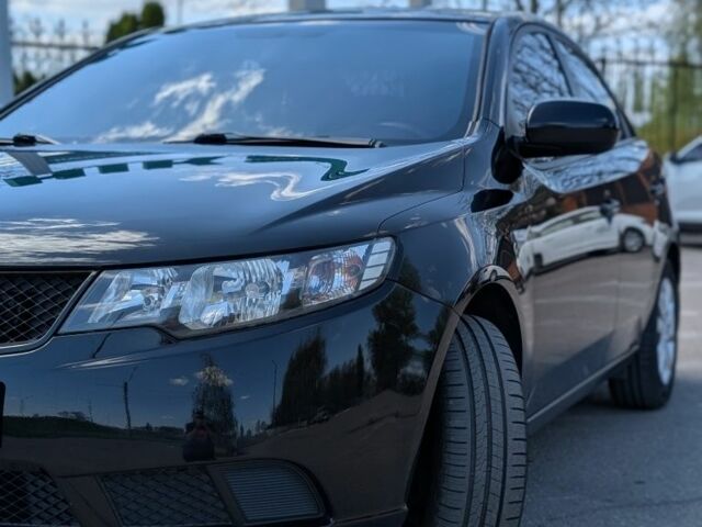 Чорний Кіа Черато, об'ємом двигуна 1.6 л та пробігом 179 тис. км за 6800 $, фото 1 на Automoto.ua