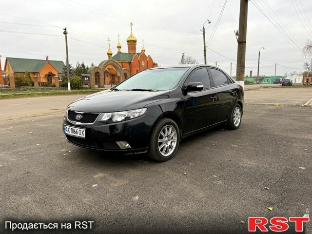 Черный Киа Черато, объемом двигателя 1.6 л и пробегом 200 тыс. км за 5650 $, фото 1 на Automoto.ua