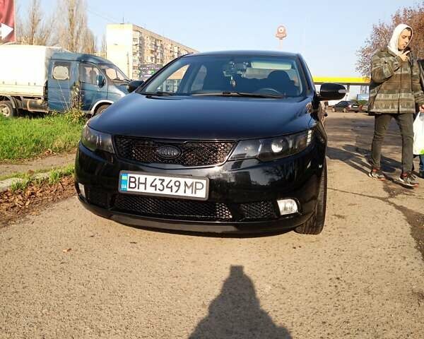 Черный Киа Черато, объемом двигателя 1.6 л и пробегом 173 тыс. км за 6500 $, фото 1 на Automoto.ua