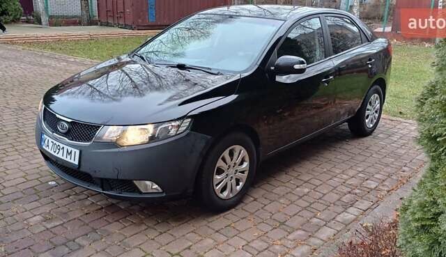 Чорний Кіа Черато, об'ємом двигуна 1.59 л та пробігом 205 тис. км за 5800 $, фото 1 на Automoto.ua