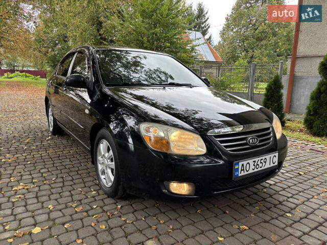 Черный Киа Черато, объемом двигателя 1.98 л и пробегом 264 тыс. км за 5800 $, фото 1 на Automoto.ua