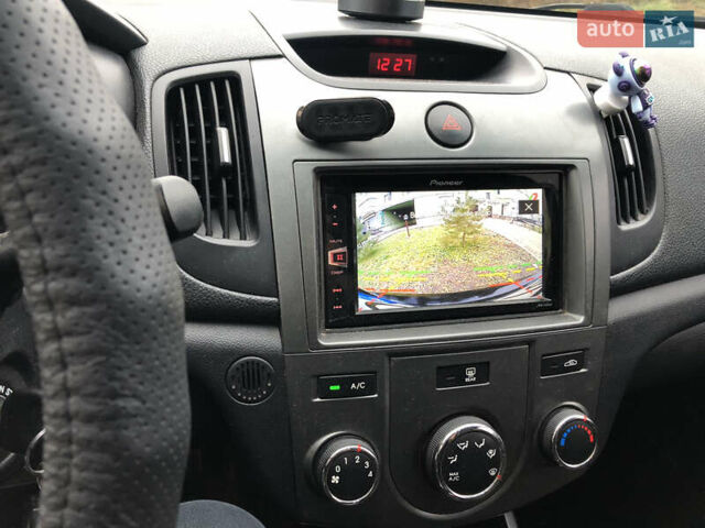 Черный Киа Черато, объемом двигателя 1.59 л и пробегом 260 тыс. км за 5800 $, фото 1 на Automoto.ua