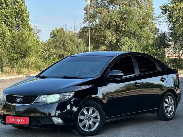 Чорний Кіа Черато, об'ємом двигуна 2 л та пробігом 170 тис. км за 5700 $, фото 1 на Automoto.ua