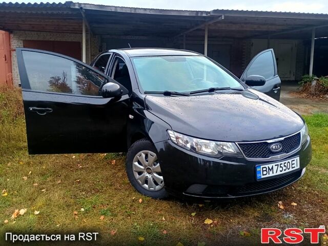 Черный Киа Черато, объемом двигателя 1.6 л и пробегом 123 тыс. км за 4900 $, фото 1 на Automoto.ua