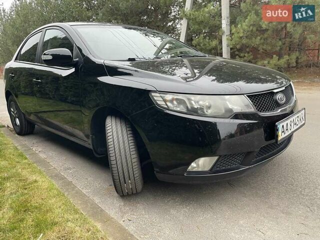 Чорний Кіа Черато, об'ємом двигуна 1.59 л та пробігом 203 тис. км за 6100 $, фото 1 на Automoto.ua