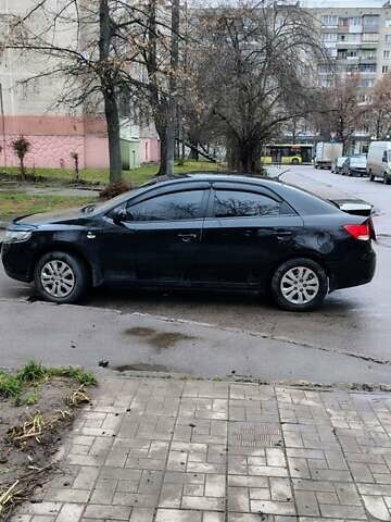 Черный Киа Черато, объемом двигателя 1.59 л и пробегом 186 тыс. км за 8000 $, фото 1 на Automoto.ua