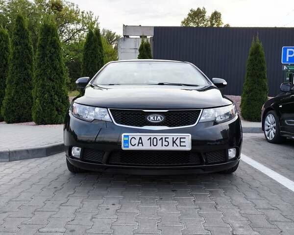 Черный Киа Черато, объемом двигателя 1.59 л и пробегом 164 тыс. км за 7500 $, фото 1 на Automoto.ua