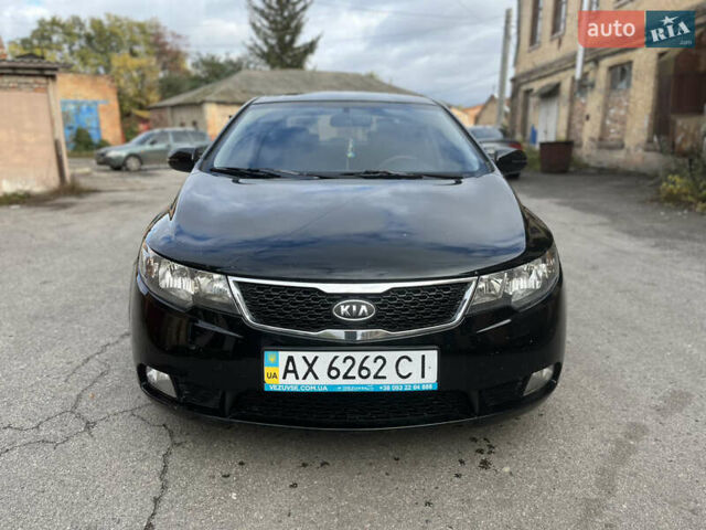 Черный Киа Черато, объемом двигателя 1.98 л и пробегом 166 тыс. км за 7500 $, фото 1 на Automoto.ua