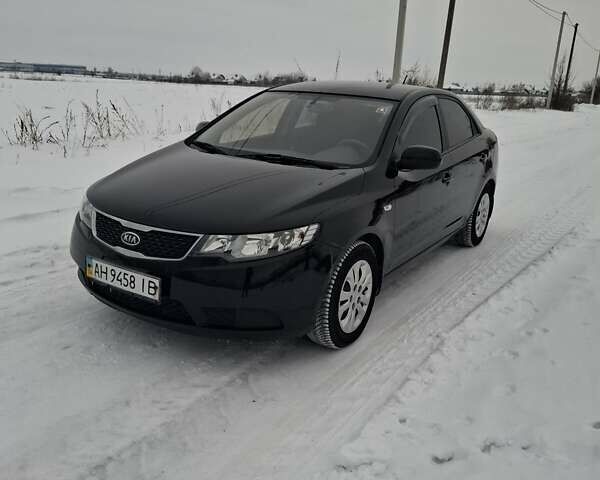 Чорний Кіа Черато, об'ємом двигуна 1.6 л та пробігом 92 тис. км за 7700 $, фото 1 на Automoto.ua