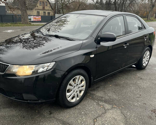 Чорний Кіа Черато, об'ємом двигуна 1.59 л та пробігом 170 тис. км за 7450 $, фото 1 на Automoto.ua