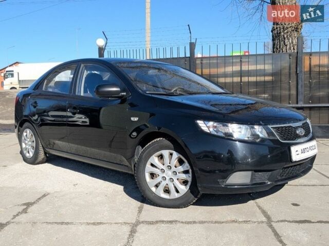 Чорний Кіа Черато, об'ємом двигуна 1.59 л та пробігом 171 тис. км за 7990 $, фото 1 на Automoto.ua