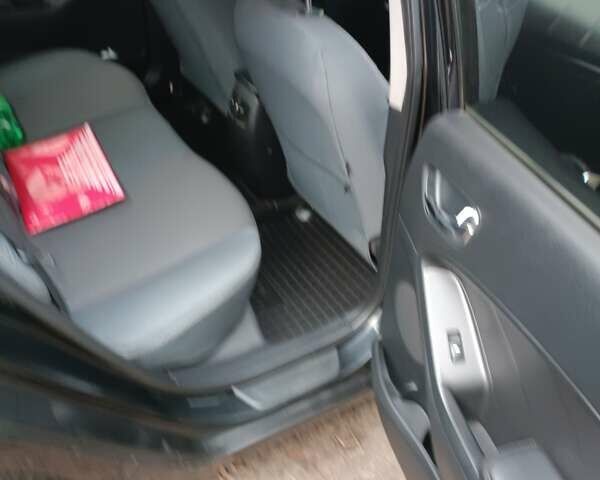 Черный Киа Черато, объемом двигателя 1.59 л и пробегом 139 тыс. км за 8600 $, фото 1 на Automoto.ua