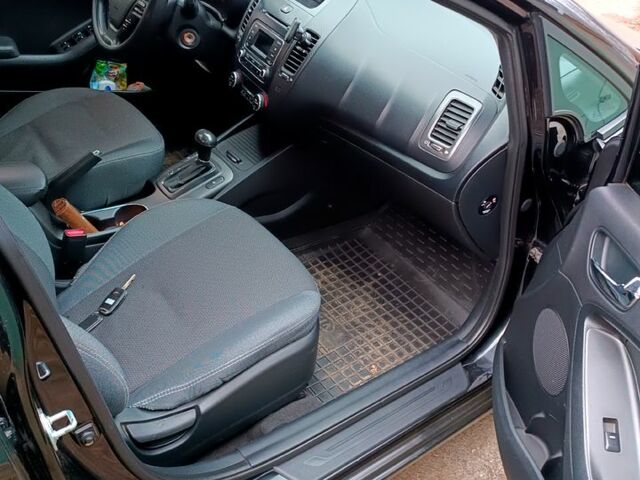 Чорний Кіа Черато, об'ємом двигуна 1.6 л та пробігом 140 тис. км за 8600 $, фото 1 на Automoto.ua